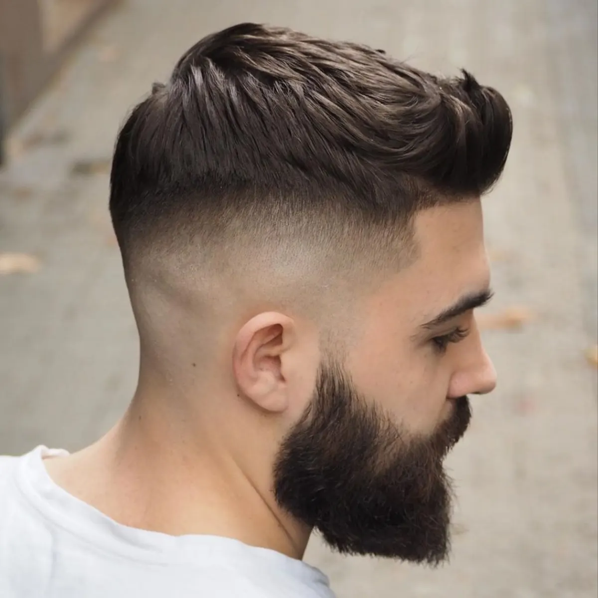 Corte con degradado y barba recortada realizado por Elmehdi